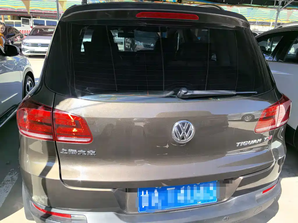 Tiguan 2015 1.8TSI automatic two-wheel drive comfort version купить на сайте DeffCars