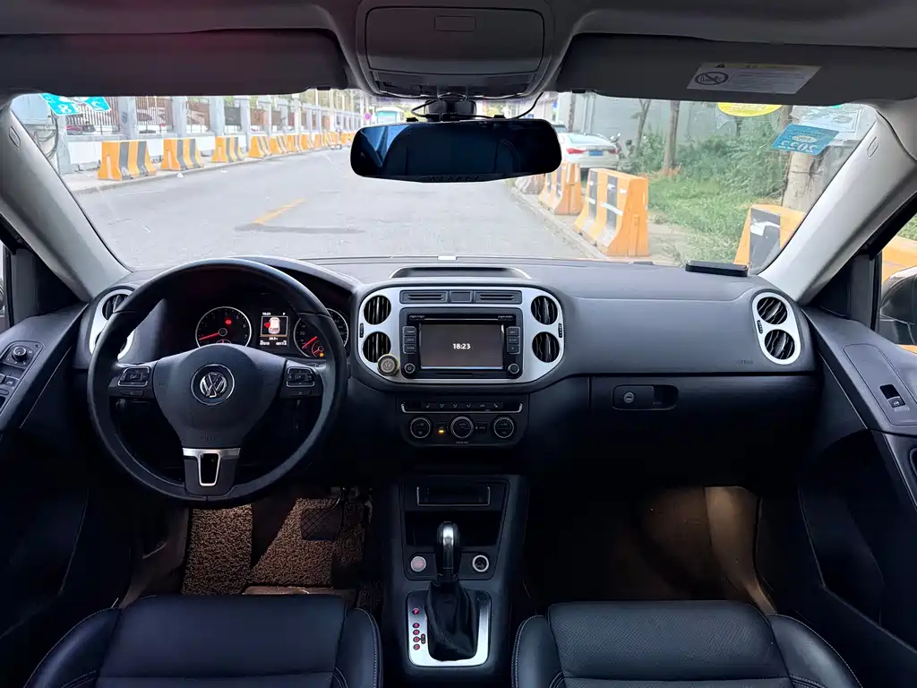 Tiguan 2015 1.8TSI automatic two-wheel drive luxury model купить на сайте DeffCars