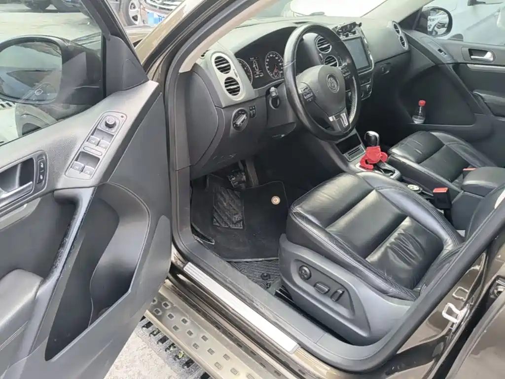 Tiguan 2015 1.8TSI automatic two-wheel drive comfort version купить на сайте DeffCars