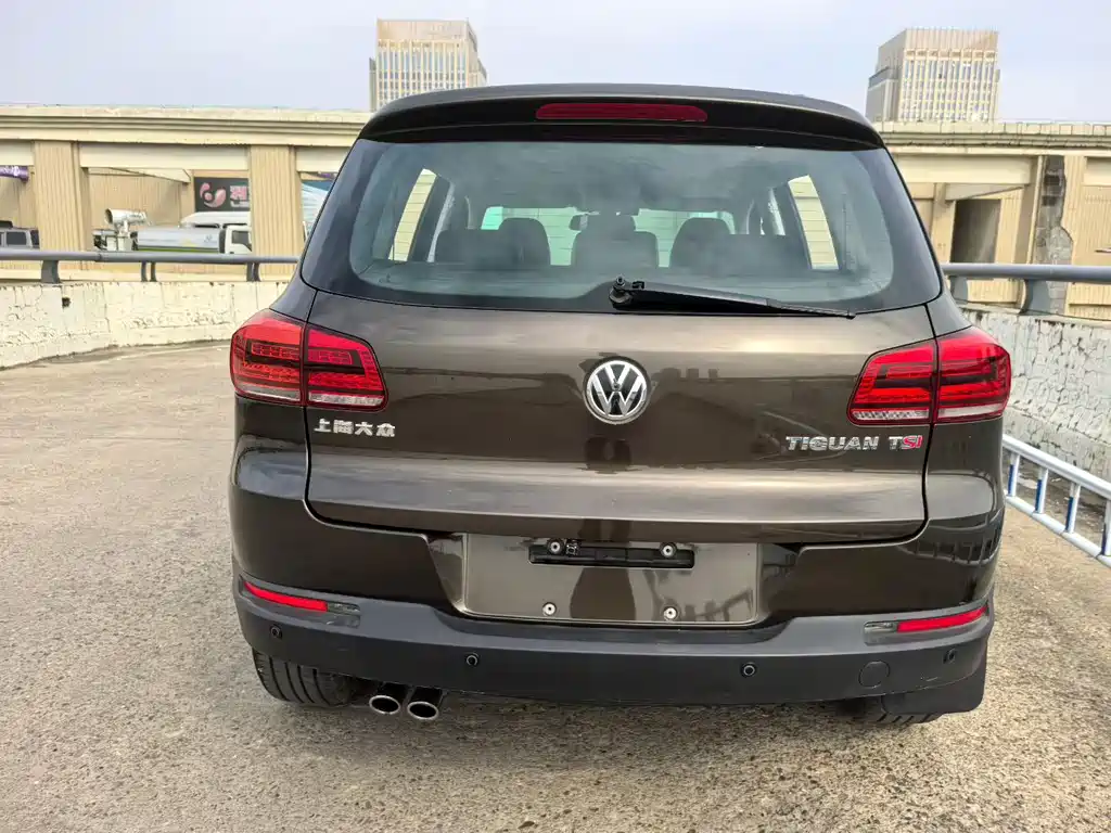 Tiguan 2015 1.8TSI automatic two-wheel drive comfort version купить на сайте DeffCars