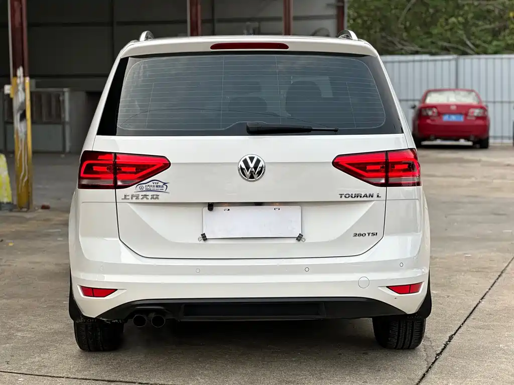Touran 2016 Touran L 280TSI DSG Shuya Edition купить на сайте DeffCars