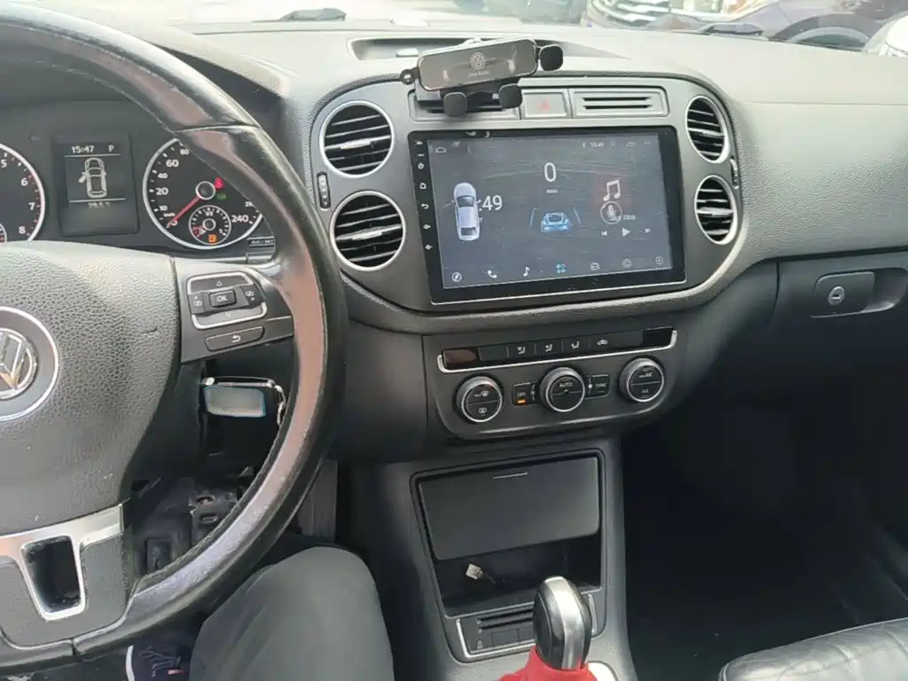Tiguan 2015 1.8TSI automatic two-wheel drive comfort version купить на сайте DeffCars