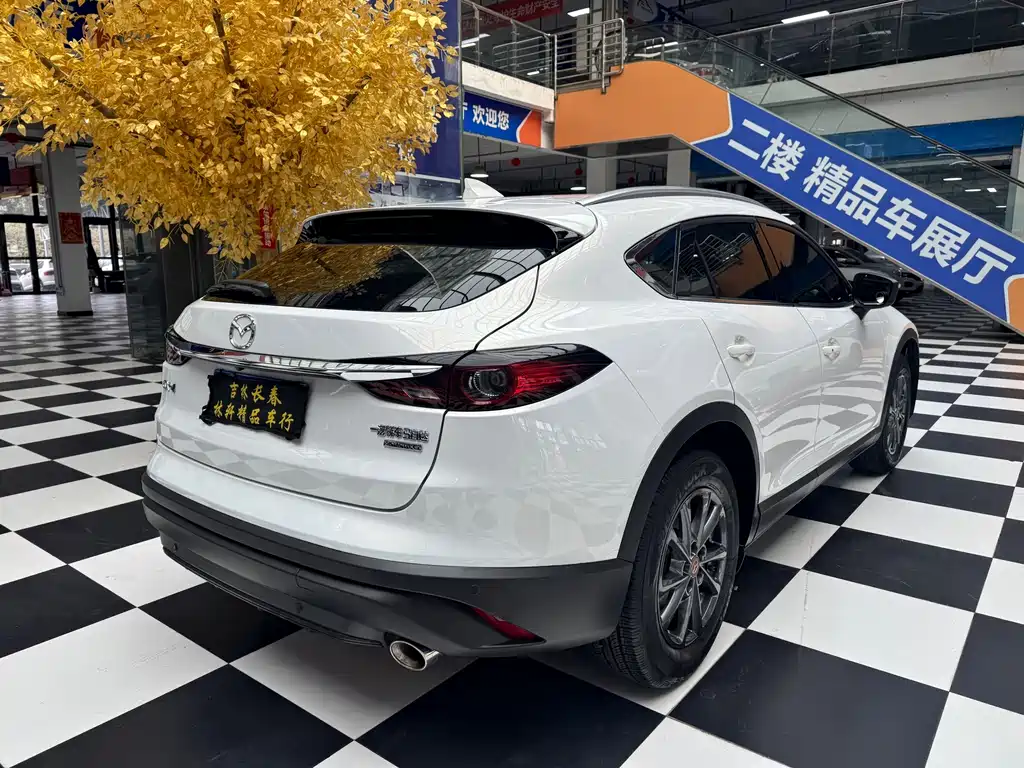 Mazda CX-4 2021 2.0L automatic two-wheel drive Blue Sky Premium Edition купить на сайте DeffCars